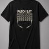 Patch Bay Studio Gear unisex t-shirt in black with patch bay with rows of jacks and two cables